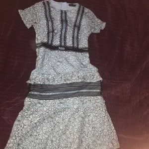 Pretty little thing long floral dress. Not really stretchy. Too small 4 me. 10